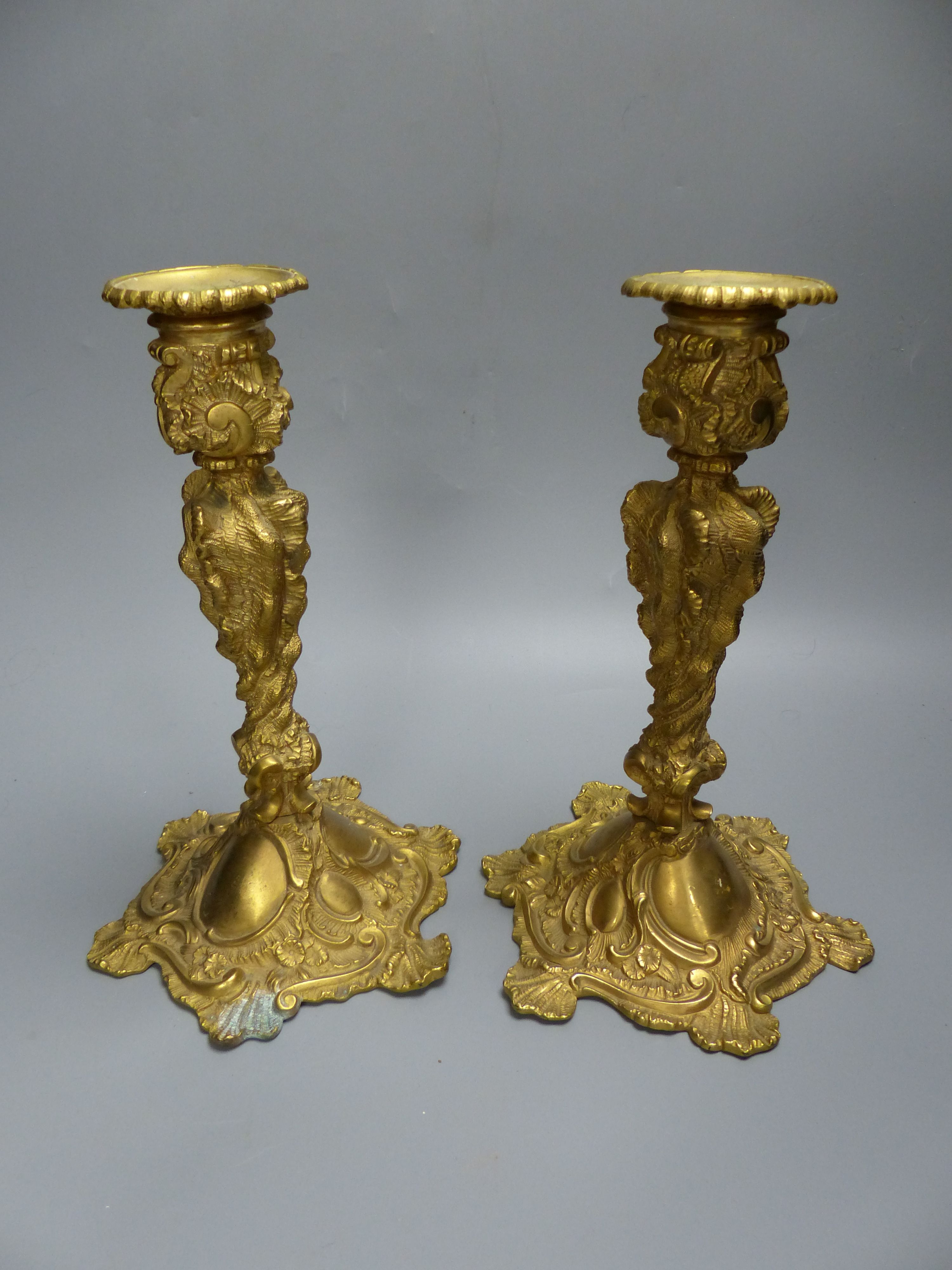 A pair of Louis XV style ormolu candlesticks, height 26.5cm